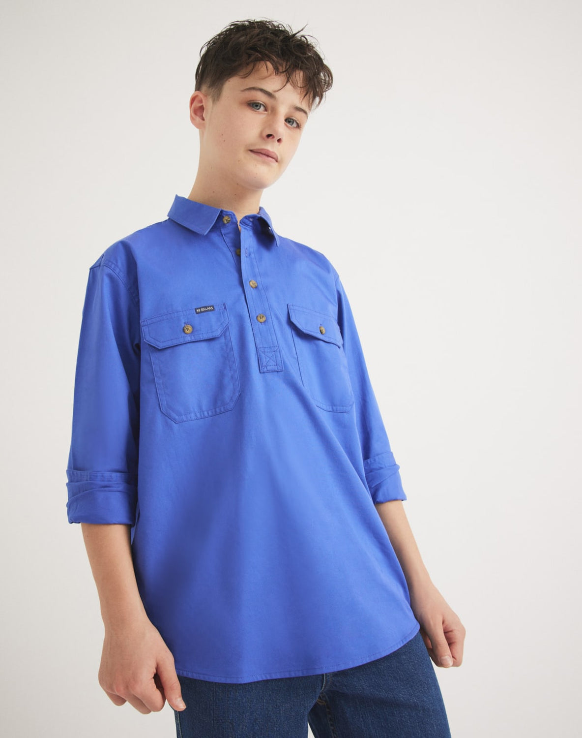 RB Sellars - Burton Junior. Blue, half button, work shirt.