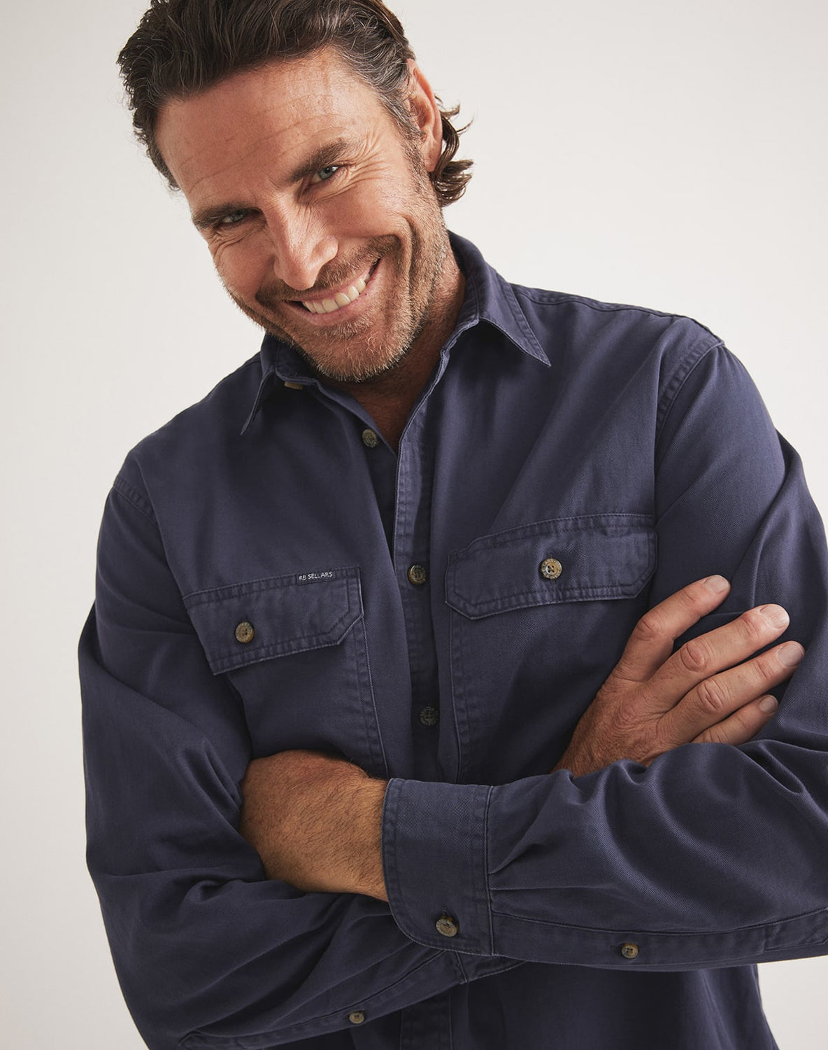 Men’s navy UPF 50 cotton twill shirt by RB Sellars – durable, sun-protective, and perfect for forestry, fly fishing, and farming.