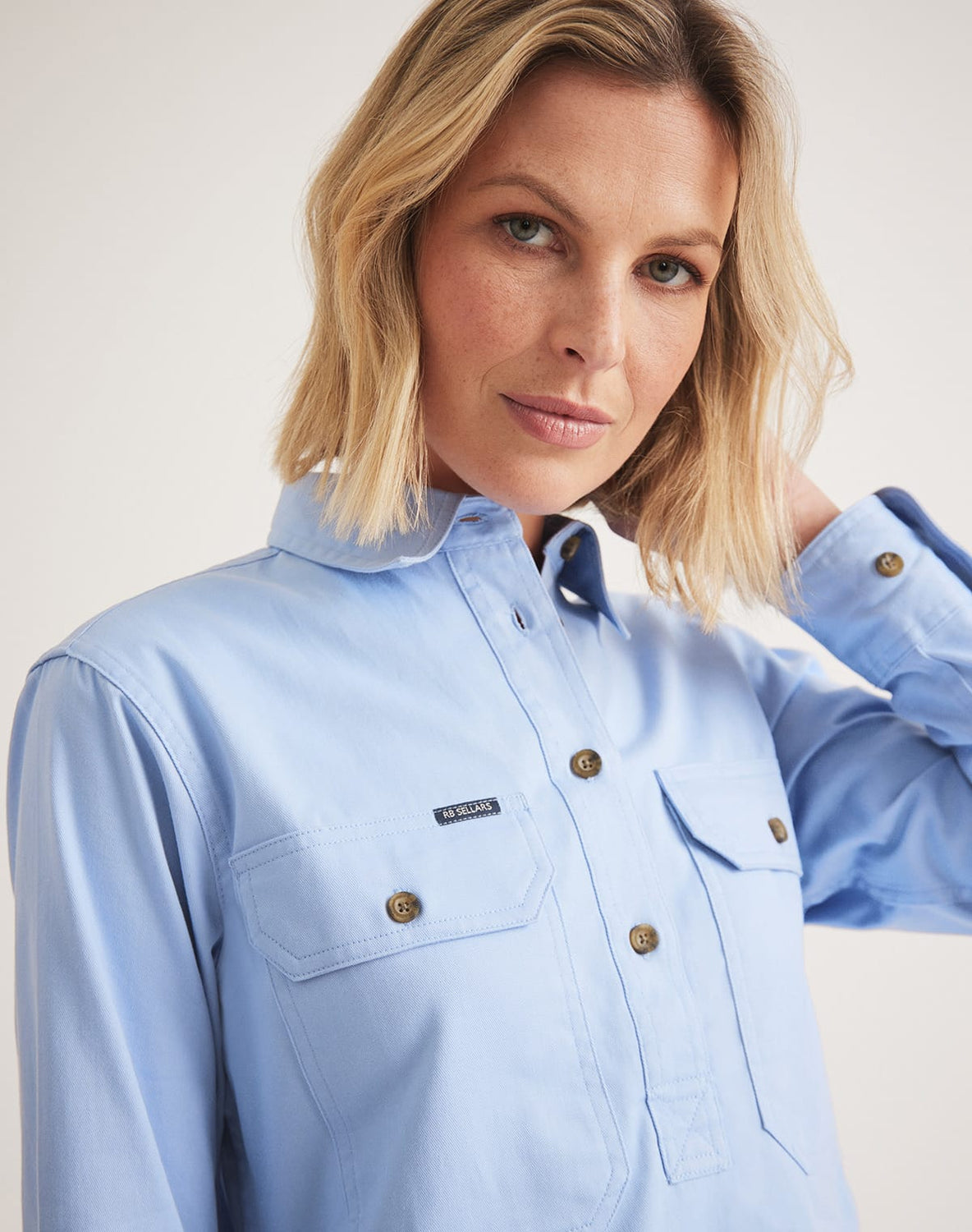 RB Sellars women's light blue UPF 30 country work shirt – breathable cotton twill, long-sleeved, and lightweight.